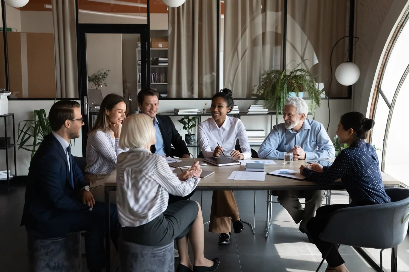 Multiethnic business team, employees of different ages discussing vuca and business strategy