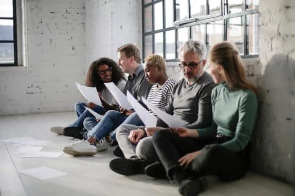 people sitting on floor